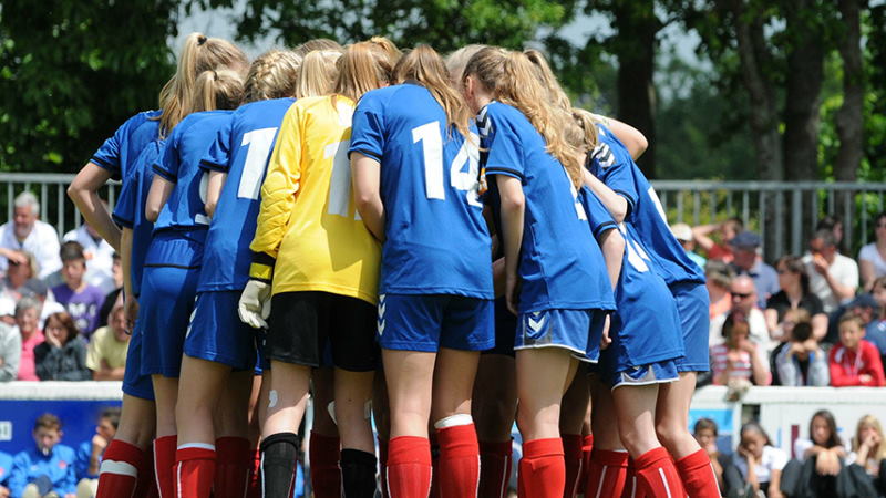 Female football huddle