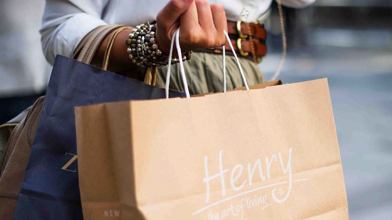 person carrying a henry bag